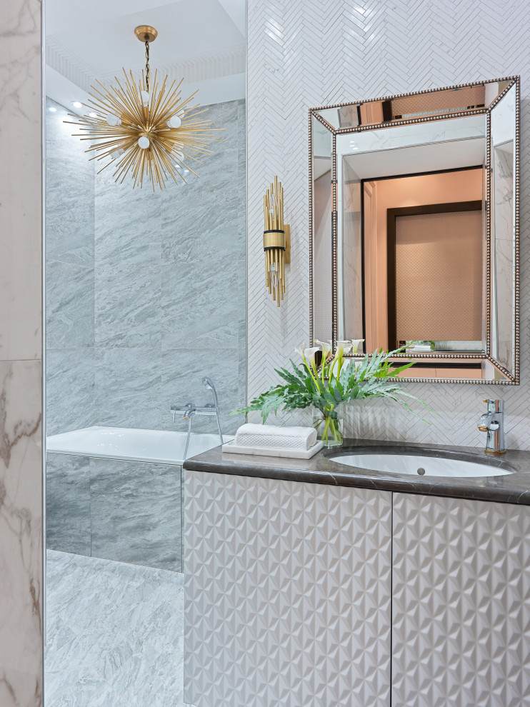 Photo of a medium sized classic shower room bathroom in Moscow with an alcove bath, an alcove shower, a wall mounted toilet, grey tiles, porcelain tiles, white walls, ceramic flooring, a submerged sink, engineered stone worktops, grey floors, a shower curtain and brown worktops.