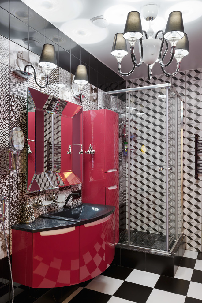 На фото: ванная комната в современном стиле с керамической плиткой, полом из керамической плитки, угловым душем, черно-белой плиткой, столешницей из искусственного камня, красными фасадами, разноцветными стенами и монолитной раковиной
