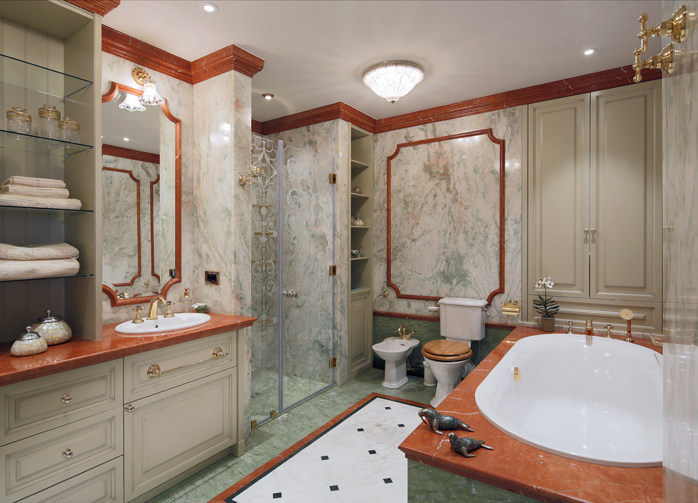 На фото: ванная комната в викторианском стиле с белыми фасадами, накладной ванной, душем в нише, раздельным унитазом, зеленой плиткой, душевой кабиной и накладной раковиной