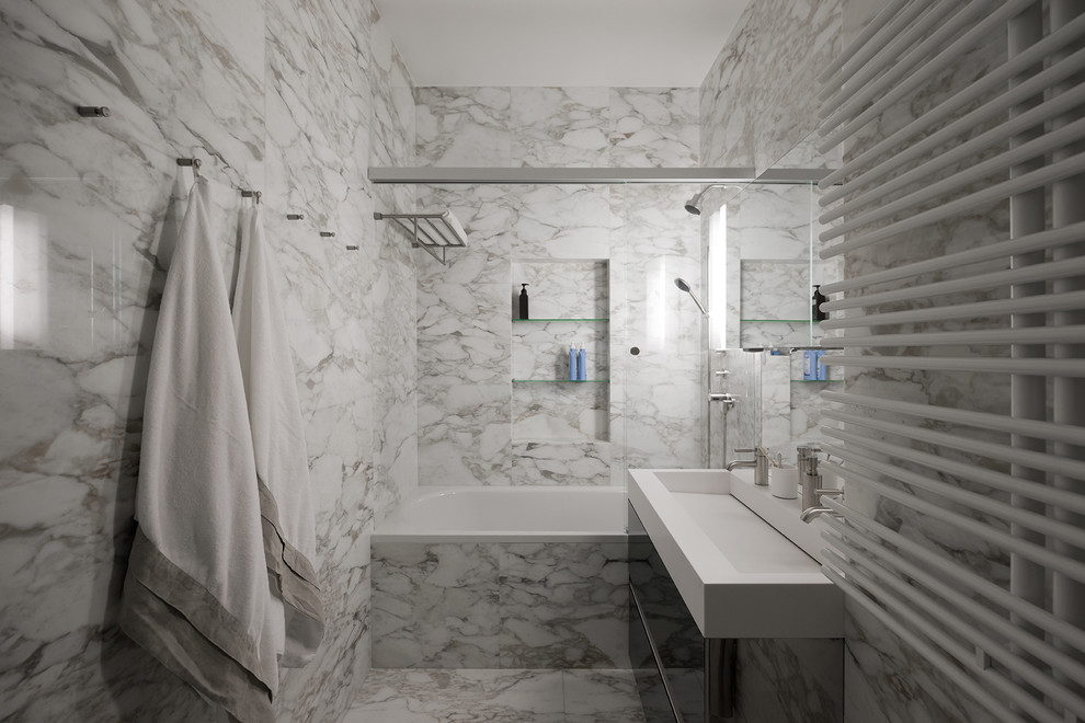 Idee per una stanza da bagno padronale design di medie dimensioni con lavabo rettangolare, ante lisce, ante nere, vasca ad alcova, vasca/doccia, piastrelle grigie, lastra di pietra, pareti bianche, pavimento in marmo e pavimento grigio