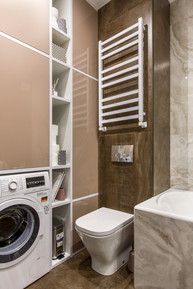 Стильный дизайн: ванная комната среднего размера со стиральной машиной в современном стиле с подвесной тумбой - последний тренд