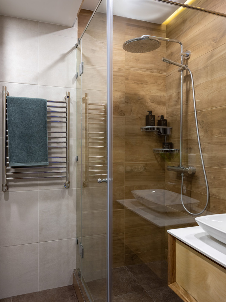 Esempio di una stanza da bagno con doccia design con ante lisce, ante in legno scuro, doccia ad angolo, lavabo a bacinella, pavimento marrone e top bianco