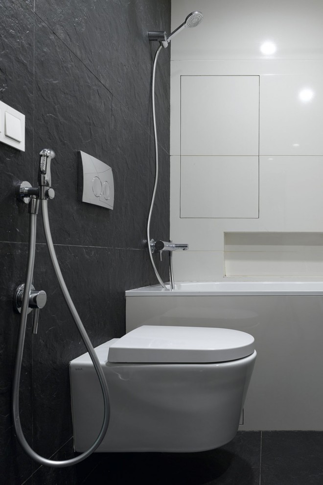 Inspiration för ett funkis badrum, med en vägghängd toalettstol