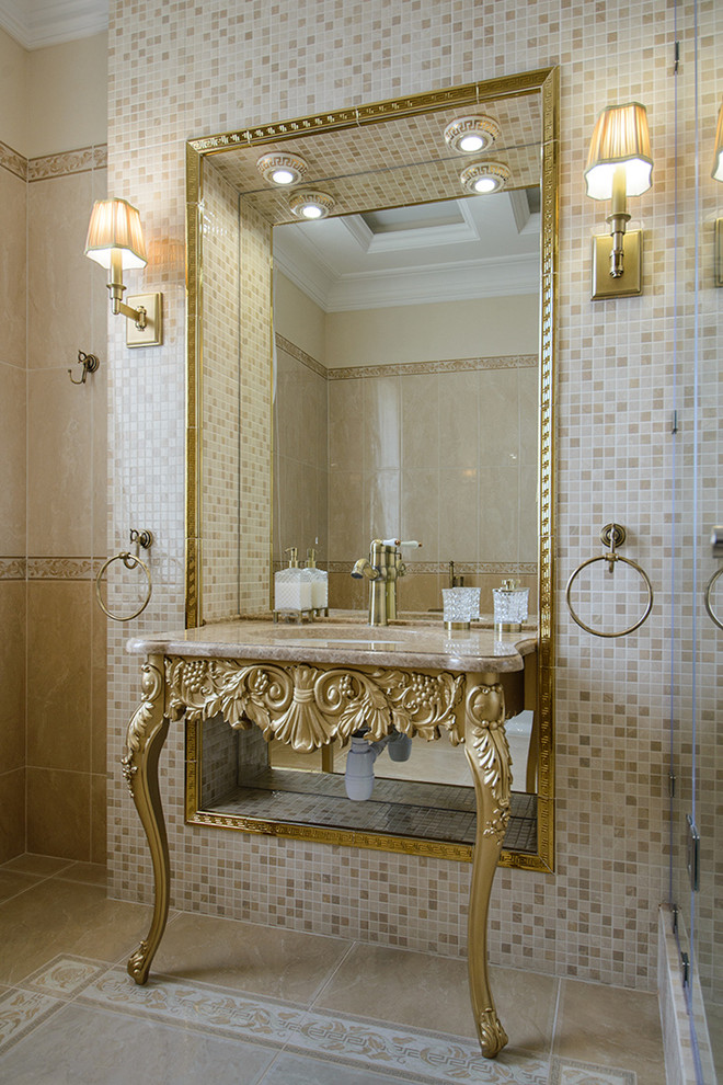 Imagen de cuarto de baño principal clásico con baldosas y/o azulejos en mosaico, lavabo tipo consola, baldosas y/o azulejos beige y paredes beige