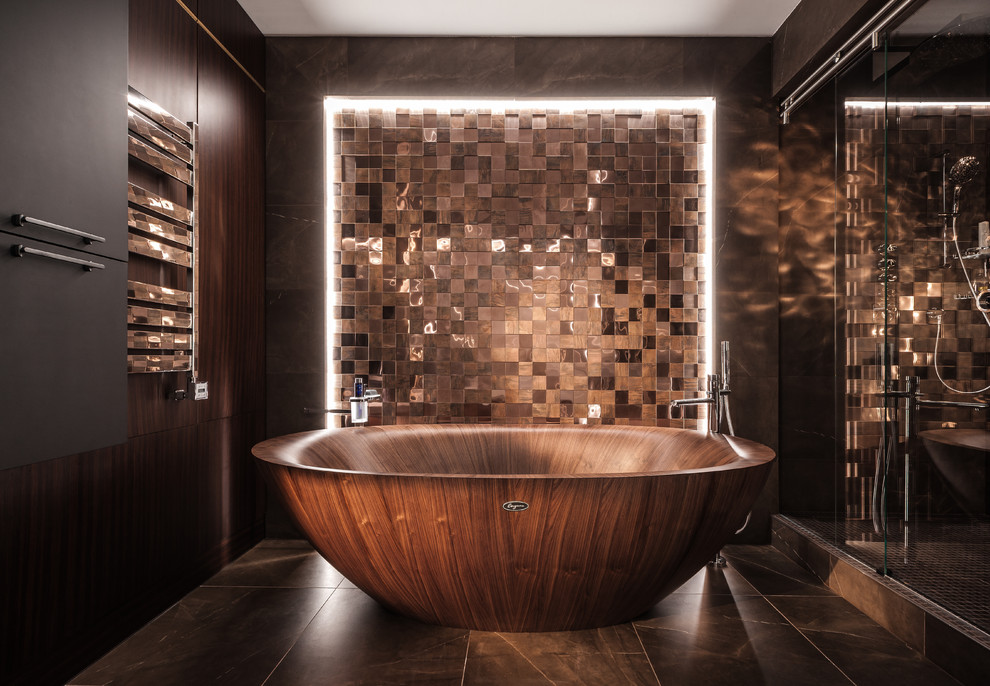 Design ideas for a contemporary ensuite bathroom in Moscow with a freestanding bath, brown tiles, brown floors, an alcove shower, a sliding door and a feature wall.