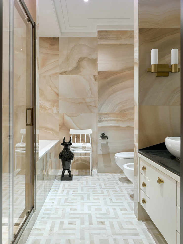 Inspiration for a transitional kids' beige tile and porcelain tile mosaic tile floor and beige floor bathroom remodel in Moscow with flat-panel cabinets, white cabinets, a vessel sink, an undermount tub, a wall-mount toilet, beige walls, solid surface countertops and black countertops
