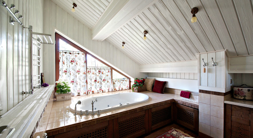 This is an example of a country ensuite bathroom in Saint Petersburg with beige tiles, ceramic tiles, white walls, tiled worktops and a built-in bath.