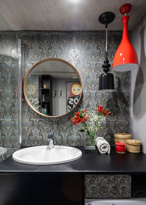 Bathroom - small industrial gray tile and ceramic tile ceramic tile, gray floor and single-sink bathroom idea in Moscow with black cabinets, gray walls, an undermount sink and black countertops