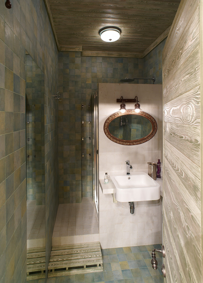 Immagine di una stanza da bagno minimal di medie dimensioni con doccia alcova, piastrelle verdi, piastrelle in gres porcellanato, pavimento con piastrelle in ceramica, pavimento verde e lavabo sospeso