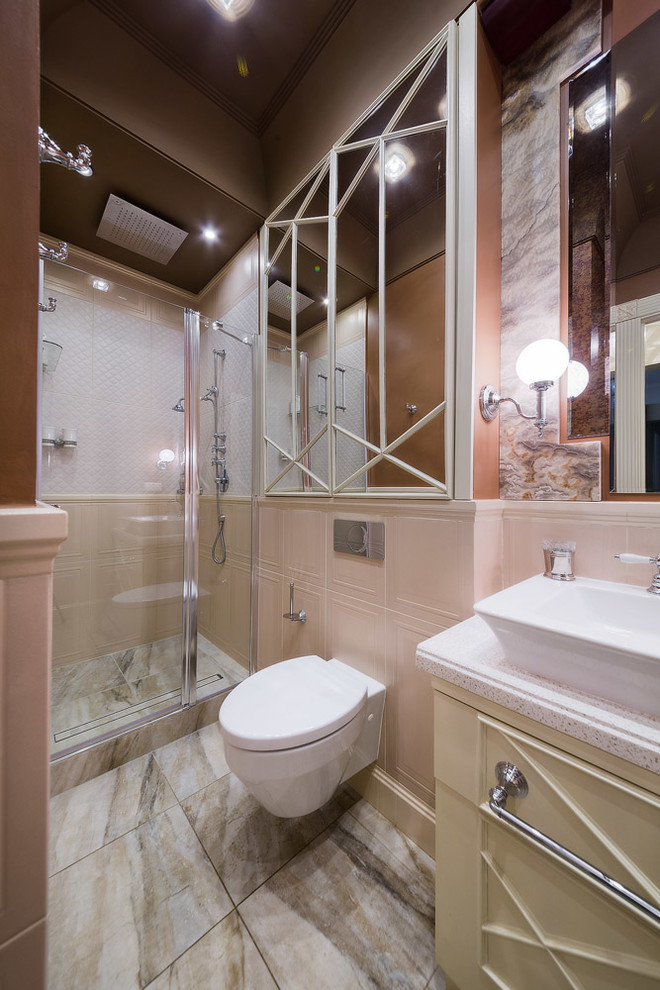 Ejemplo de cuarto de baño contemporáneo con puertas de armario beige, ducha empotrada, sanitario de pared y lavabo sobreencimera