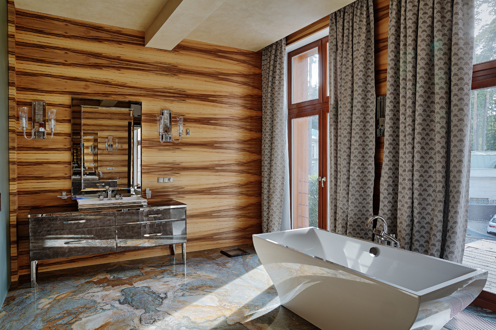 Idee per una grande stanza da bagno padronale contemporanea con ante grigie, vasca freestanding, lavabo da incasso e ante lisce