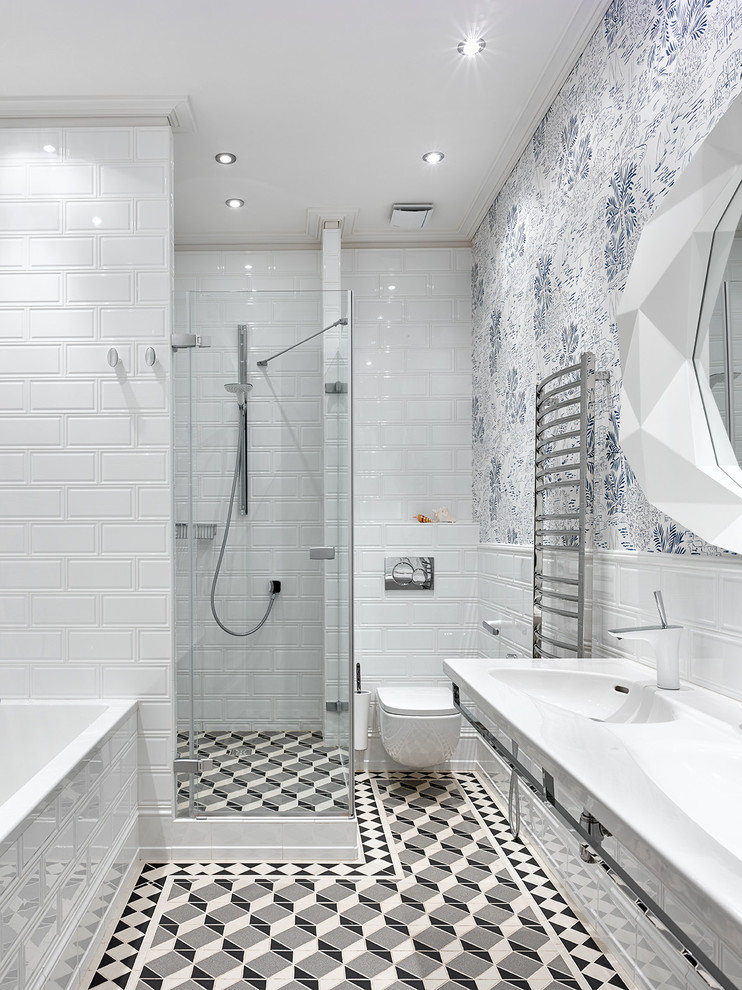 На фото: главная ванная комната среднего размера в стиле неоклассика (современная классика) с душем в нише, инсталляцией, белой плиткой, керамической плиткой, белыми стенами, монолитной раковиной, накладной ванной и полом из керамической плитки с