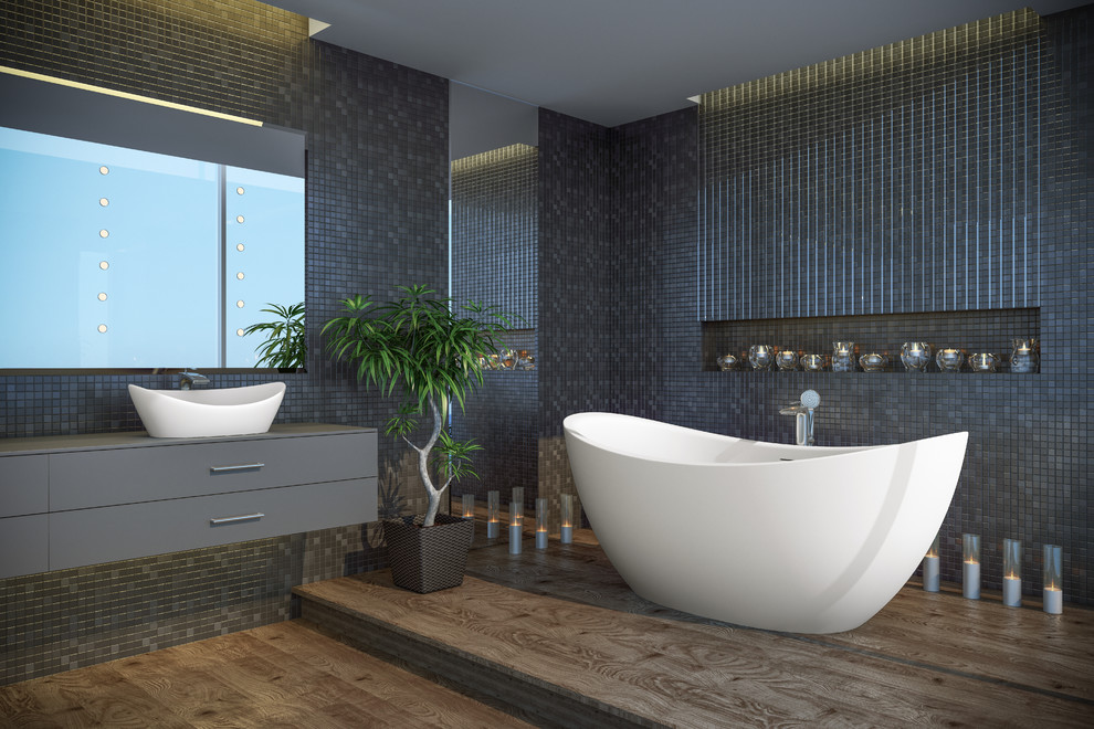 Idéer för stora funkis en-suite badrum, med ett fristående badkar, grå kakel, mosaik, grå väggar, mellanmörkt trägolv och ett nedsänkt handfat