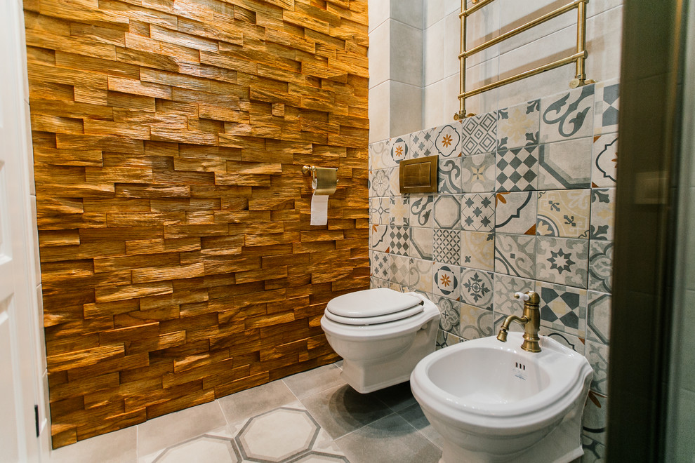 Inspiration for a medium sized mediterranean shower room bathroom in Moscow with a corner shower, a wall mounted toilet, grey tiles, porcelain tiles, grey walls, porcelain flooring, a vessel sink, wooden worktops, grey floors and a sliding door.