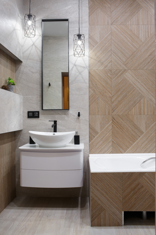 Example of a trendy 3/4 beige tile light wood floor and beige floor bathroom design in Other with flat-panel cabinets, white cabinets, beige walls, white countertops and a vessel sink