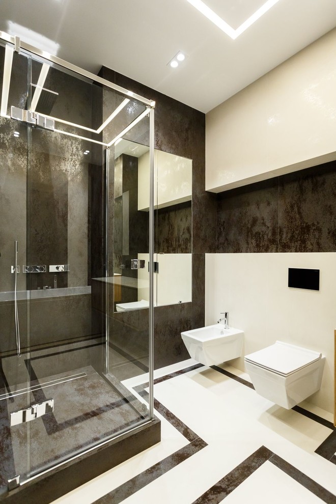 На фото: ванная комната в современном стиле с инсталляцией, коричневой плиткой, душевой кабиной и разноцветным полом с