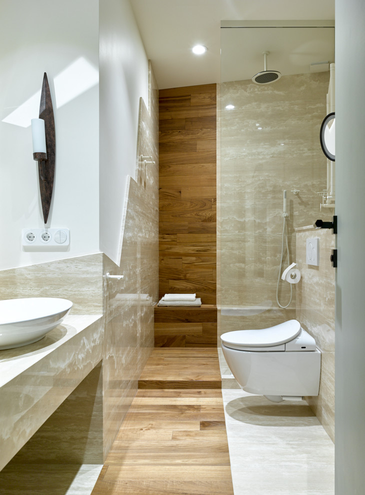 Contemporary shower room bathroom in Other with an alcove shower, a wall mounted toilet, white walls, a vessel sink, beige tiles, an open shower, travertine tiles, travertine flooring and beige floors.