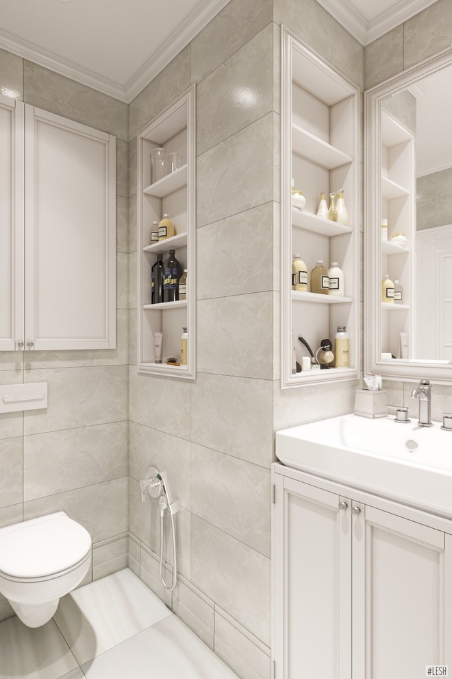 Medium sized traditional ensuite bathroom in Saint Petersburg with beige cabinets, a wall mounted toilet, beige tiles, beige walls, flat-panel cabinets, a freestanding bath, a shower/bath combination, ceramic tiles, porcelain flooring, an integrated sink, white floors and a shower curtain.
