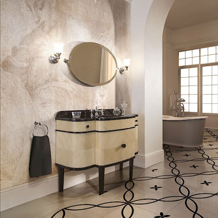 Immagine di una piccola stanza da bagno padronale contemporanea con ante a filo, ante in legno chiaro, top in marmo, top nero, un lavabo e mobile bagno freestanding