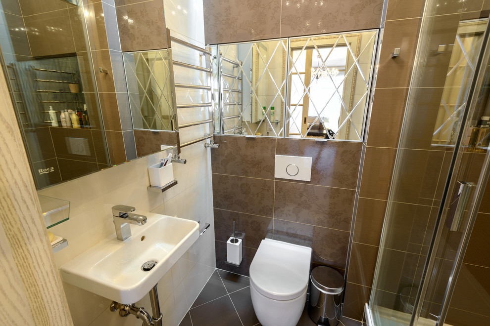 Immagine di una stanza da bagno contemporanea con bidè e lavabo da incasso