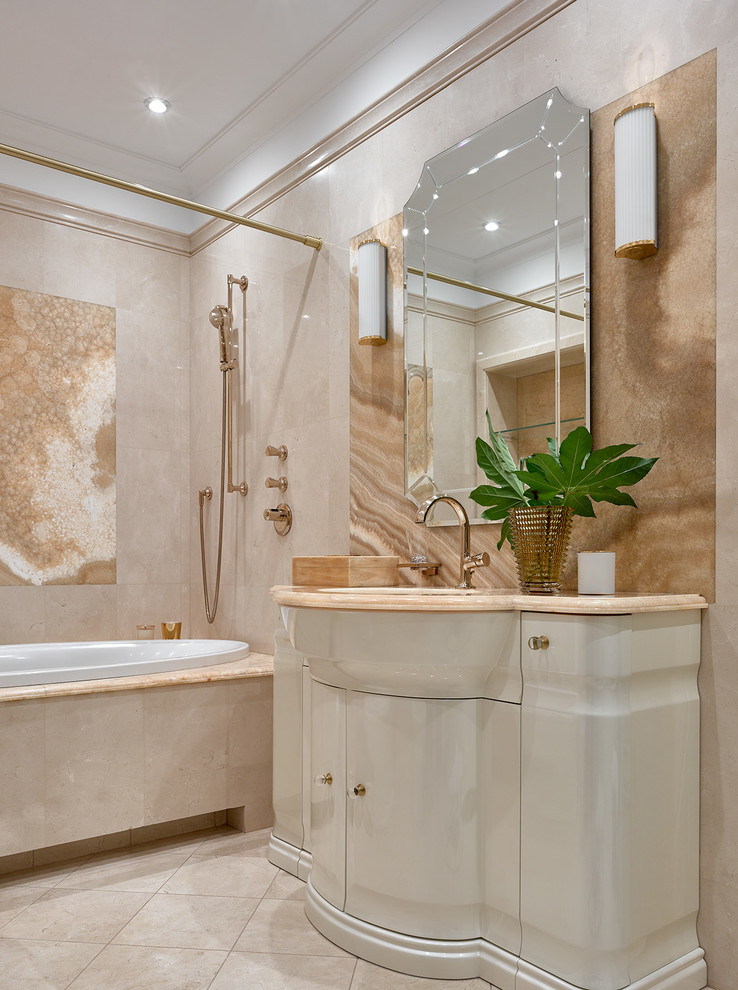На фото: главная ванная комната в классическом стиле с плоскими фасадами, белыми фасадами, врезной раковиной, бежевым полом и бежевой столешницей с