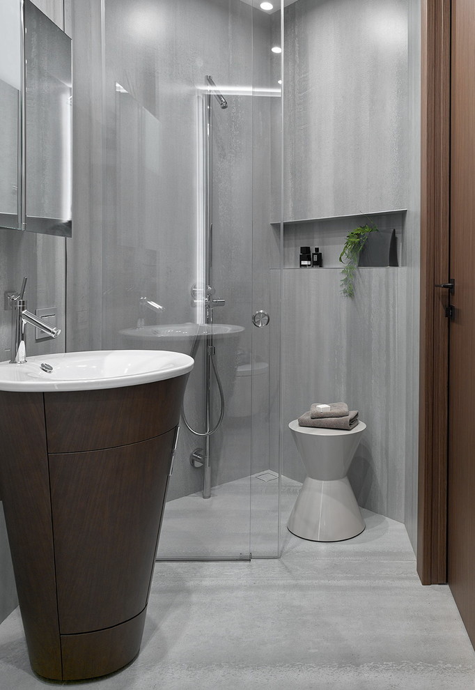 Inspiration for a medium sized contemporary shower room bathroom in Moscow with grey tiles, porcelain tiles, porcelain flooring, a pedestal sink, grey floors, a sliding door and a built-in shower.