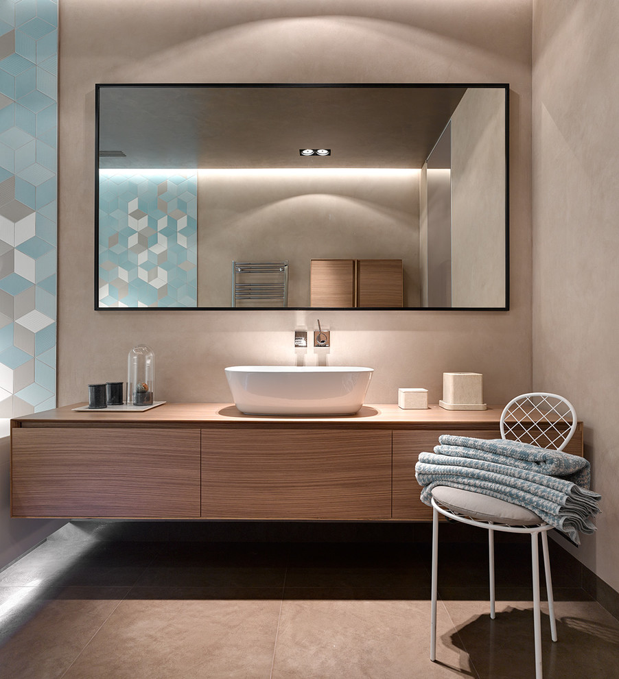 Photo of a contemporary bathroom in Moscow with flat-panel cabinets, blue tiles, white tiles, beige walls, a vessel sink, dark wood cabinets and beige floors.