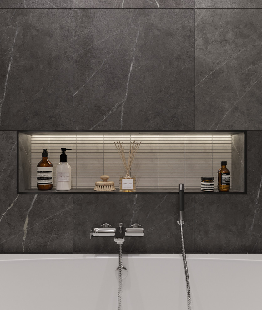 Пример оригинального дизайна: маленькая главная ванная комната в современном стиле с плоскими фасадами, черными фасадами, инсталляцией, серыми стенами, монолитной раковиной, столешницей из искусственного камня, серым полом, шторкой для ванной, белой столешницей, полновстраиваемой ванной, черной плиткой, керамогранитной плиткой, полом из керамогранита, тумбой под одну раковину и подвесной тумбой для на участке и в саду