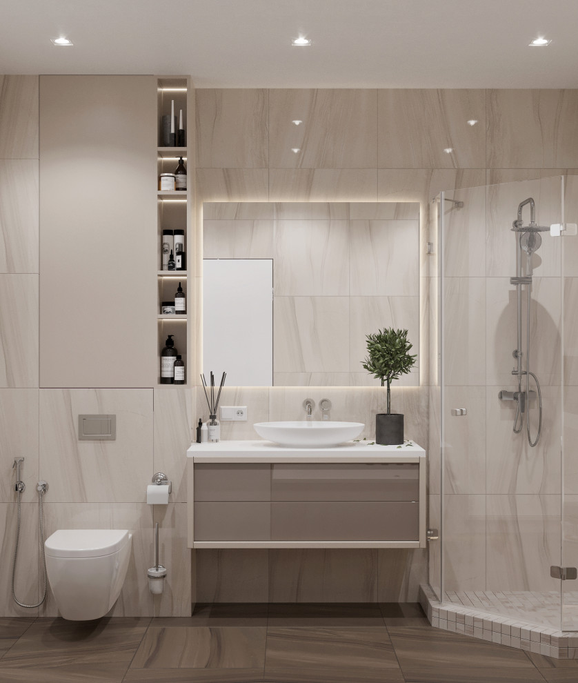 Bild på ett mellanstort funkis vit vitt badrum med dusch, med släta luckor, ett undermonterat badkar, en hörndusch, en vägghängd toalettstol, beige kakel, porslinskakel, beige väggar, ett fristående handfat, bänkskiva i akrylsten, brunt golv, dusch med gångjärnsdörr, bruna skåp och klinkergolv i porslin