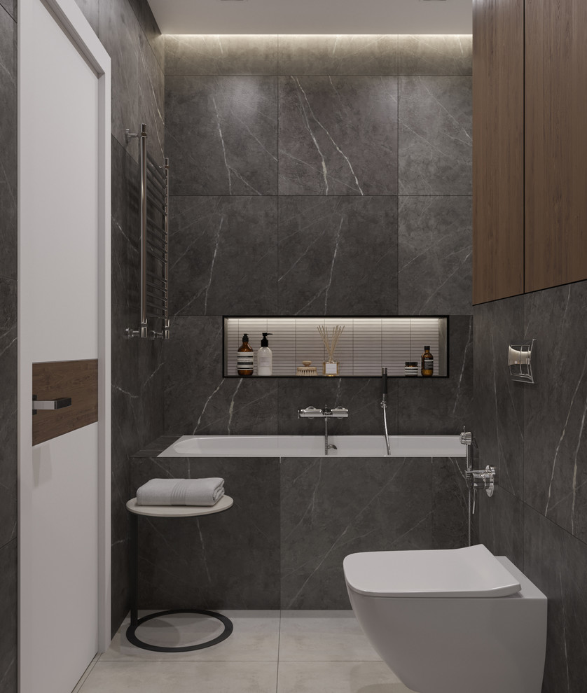 Свежая идея для дизайна: маленькая главная ванная комната в современном стиле с плоскими фасадами, черными фасадами, инсталляцией, серыми стенами, монолитной раковиной, столешницей из искусственного камня, серым полом, шторкой для ванной, белой столешницей, полновстраиваемой ванной, черной плиткой, керамогранитной плиткой, полом из керамогранита, тумбой под одну раковину и подвесной тумбой для на участке и в саду - отличное фото интерьера