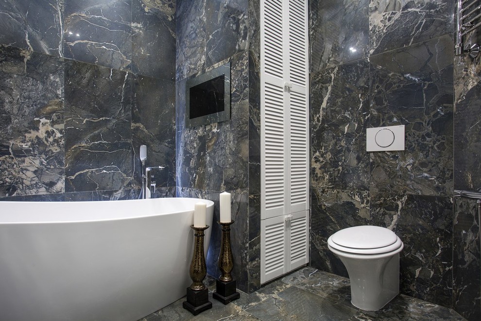 Idee per una stanza da bagno padronale chic con piastrelle grigie