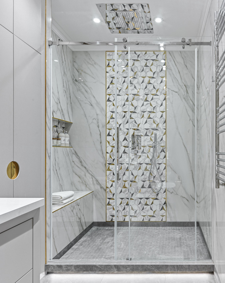 На фото: ванная комната в современном стиле с бирюзовыми фасадами, монолитной раковиной, серым полом, тумбой под одну раковину и напольной тумбой с