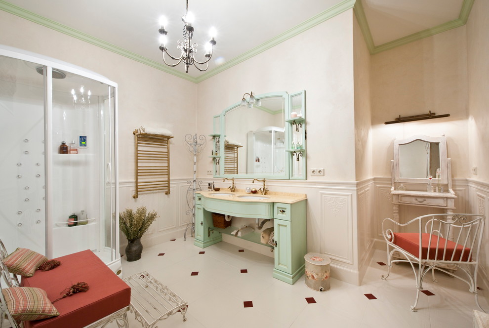 Idéer för medelhavsstil badrum med dusch, med gröna skåp, en hörndusch, vit kakel, vita väggar, ett undermonterad handfat och klinkergolv i porslin