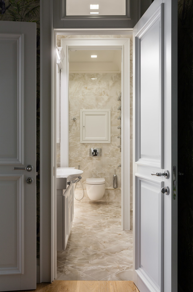 Small transitional beige tile and ceramic tile ceramic tile and beige floor bathroom photo in Moscow with white cabinets and a wall-mount toilet