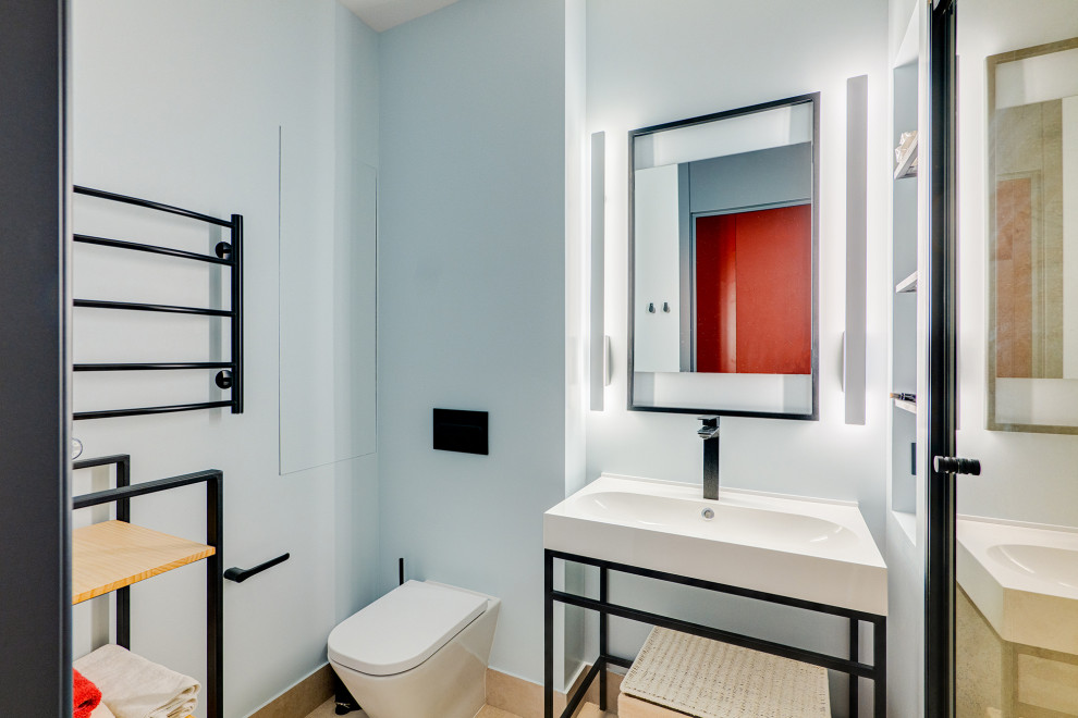 Свежая идея для дизайна: ванная комната в современном стиле с синими стенами, душевой кабиной, монолитной раковиной, тумбой под одну раковину и напольной тумбой - отличное фото интерьера