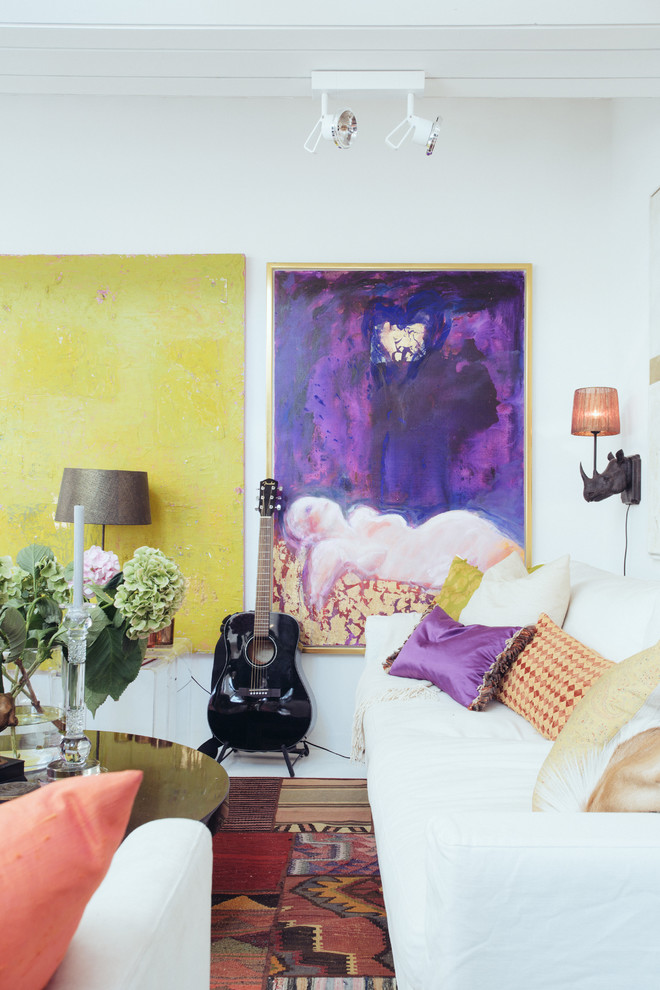 Large danish open concept living room photo in Stockholm with a music area, white walls, no fireplace and no tv
