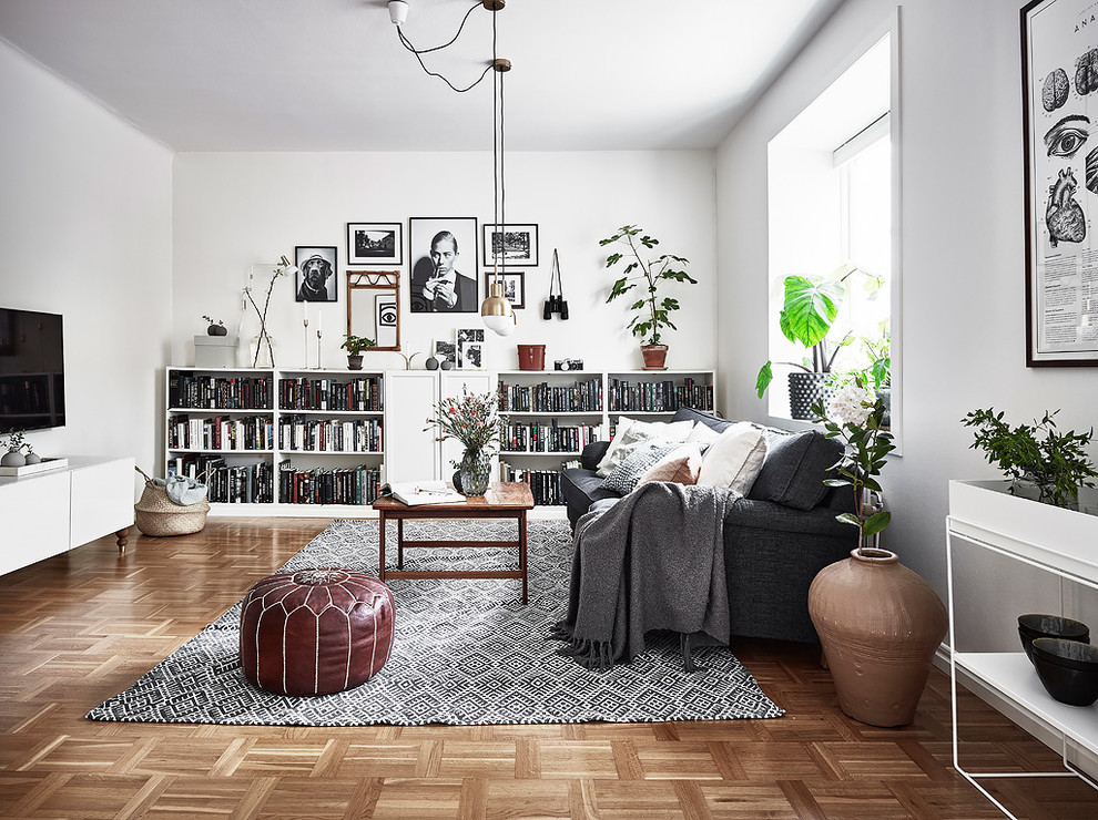 Ispirazione per un soggiorno scandinavo di medie dimensioni con pareti bianche