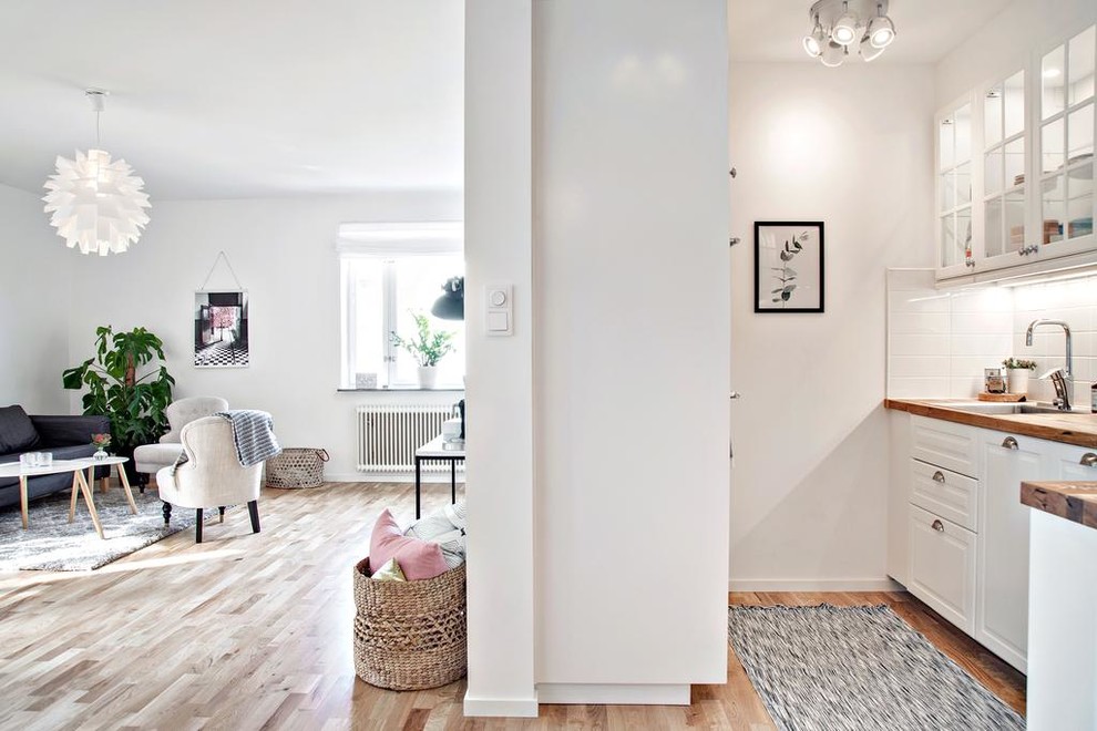 Свежая идея для дизайна: гостиная комната в скандинавском стиле - отличное фото интерьера