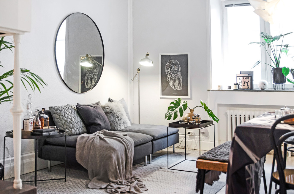 Источник вдохновения для домашнего уюта: открытая, парадная гостиная комната среднего размера в скандинавском стиле с белыми стенами без телевизора