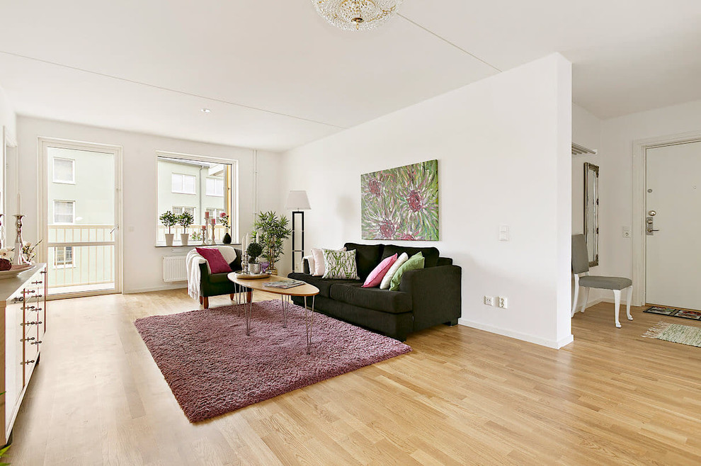 Foto på ett minimalistiskt vardagsrum