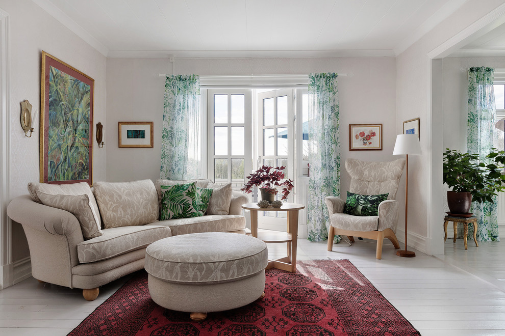 Photo of a classic formal enclosed living room in Gothenburg with grey walls, painted wood flooring and white floors.