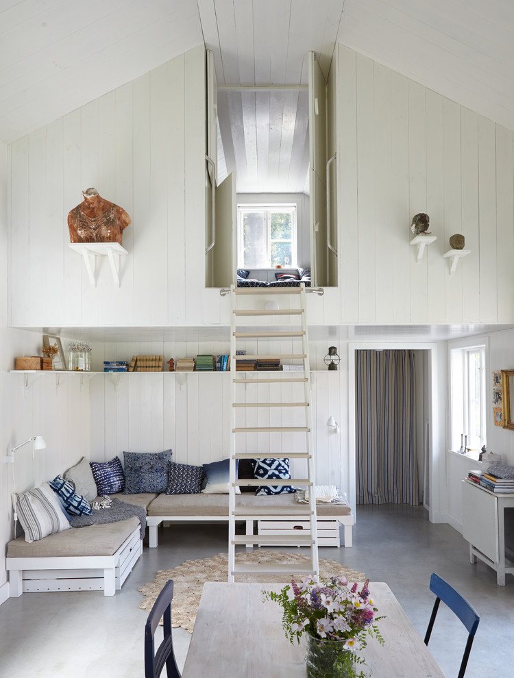 Idéer för mycket stora minimalistiska vardagsrum, med ett finrum, vita väggar och betonggolv