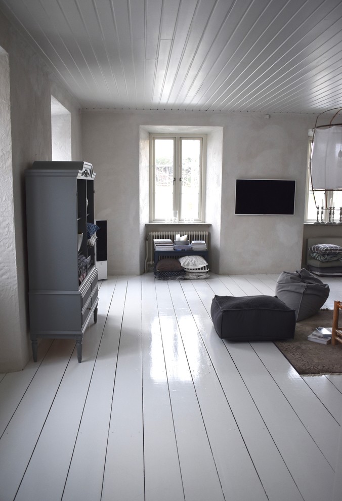 На фото: гостиная комната в скандинавском стиле