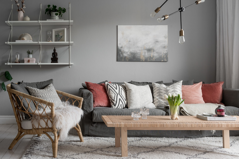Idéer för mellanstora nordiska separata vardagsrum, med grå väggar, ljust trägolv och vitt golv