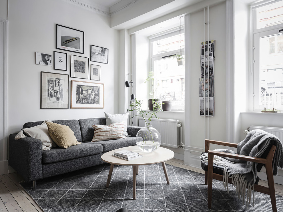 Inspiration för mellanstora nordiska separata vardagsrum, med vita väggar, ett finrum och beiget golv