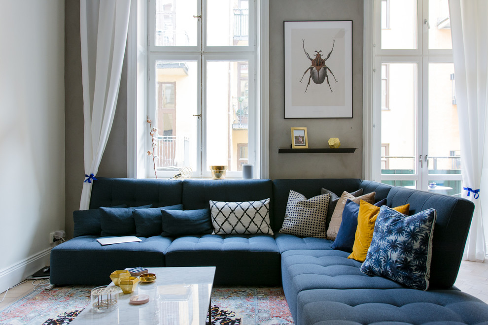 Living room - mid-sized scandinavian open concept light wood floor living room idea in Stockholm with gray walls, no fireplace and no tv
