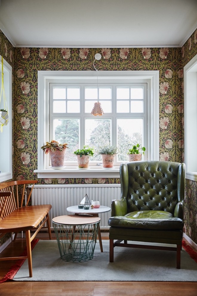 Living room - mid-sized traditional formal and enclosed dark wood floor living room idea in Gothenburg with multicolored walls