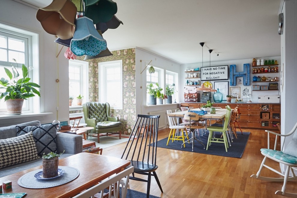 Living room - mid-sized scandinavian open concept light wood floor living room idea in Gothenburg with white walls
