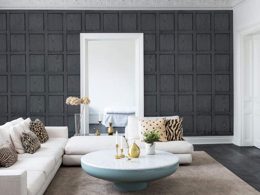 Foto di un soggiorno design chiuso con pareti grigie, pavimento nero, sala formale e parquet scuro