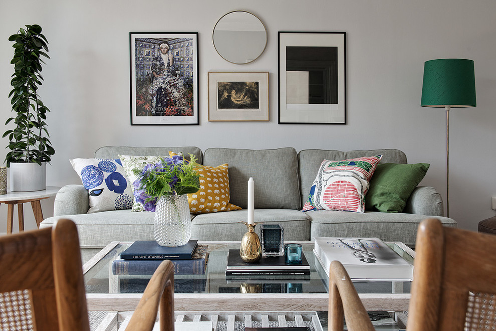 Example of a mid-sized danish formal and enclosed living room design in Gothenburg with white walls, no fireplace and no tv